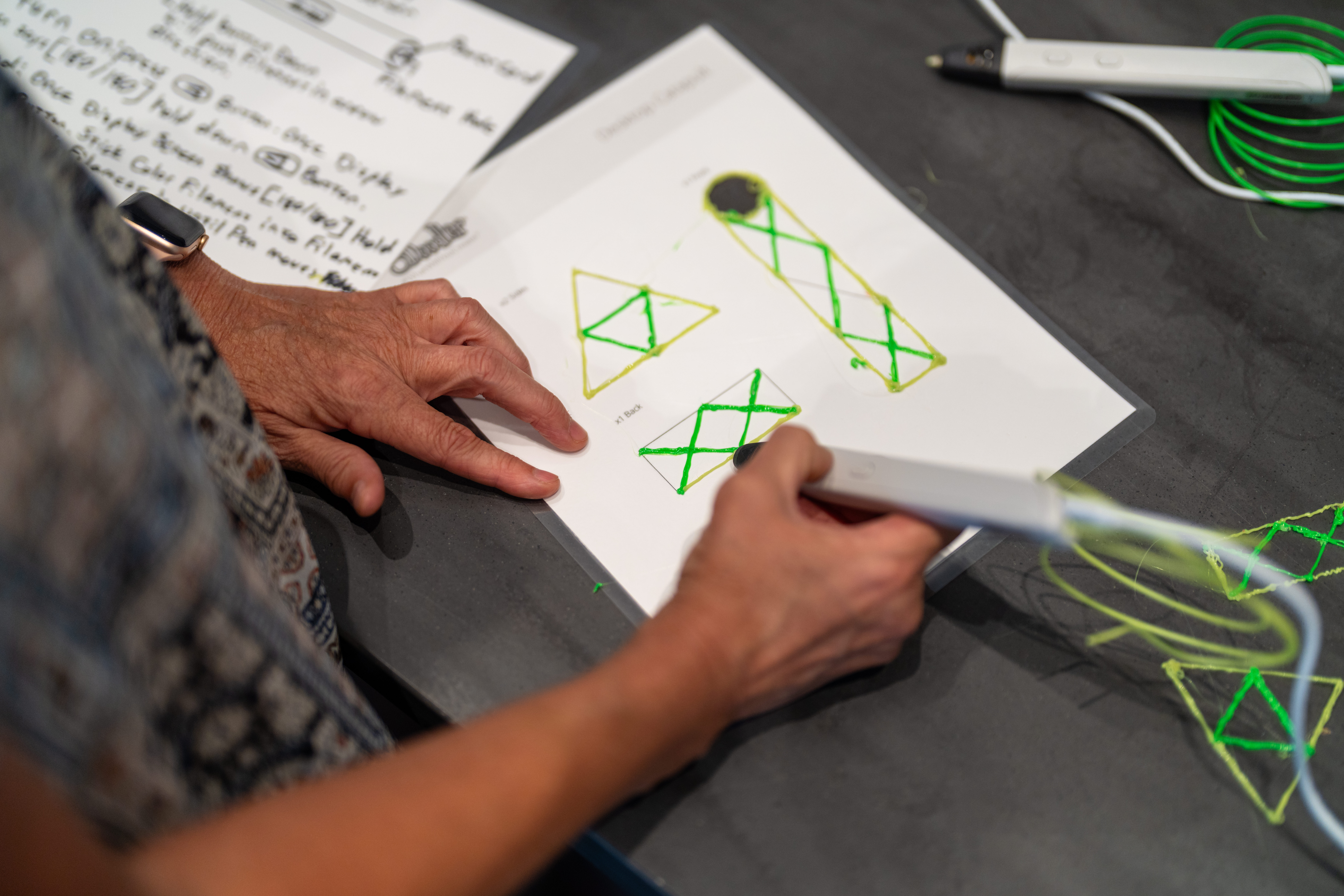 Hands of student working on an assignement
